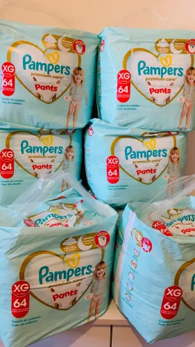 Fralda Pampers premium care pants xg