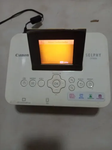 Canon Selphy CP 1000 impressora portátil. 
