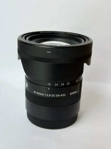 Lente sigma 18-50
