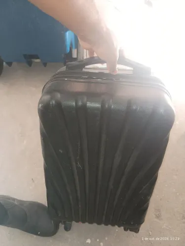 Mala com defeito