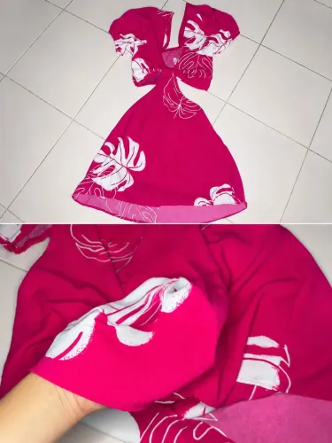 Macacão short saia rosa