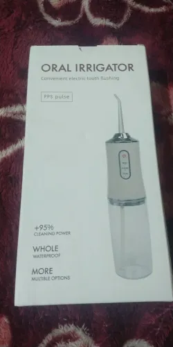 Irrigador dental