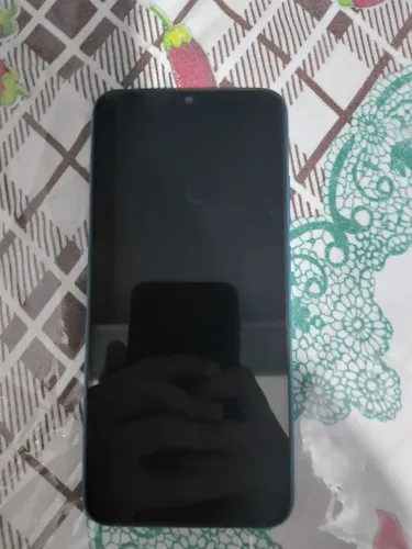 Redmi 9A em perfeito estado,com película nova e carregador junto