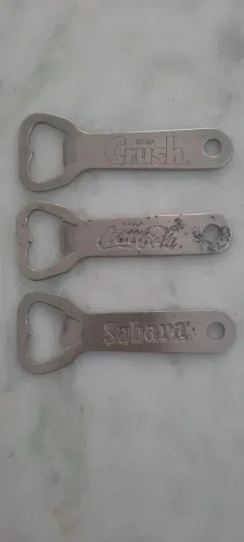 Abridores  de  Garrafa   Caninha  Sabará   Coca - Cola   Crush
