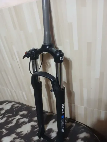 SUSPENSÃO SR SUNTOUR ARO 29