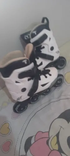 Patins branco , número 35/36 da marca traxart.pouco usado está novinho.o valor 600