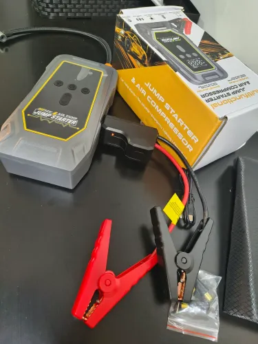 Auxiliar de partida com compressor de ar portátil