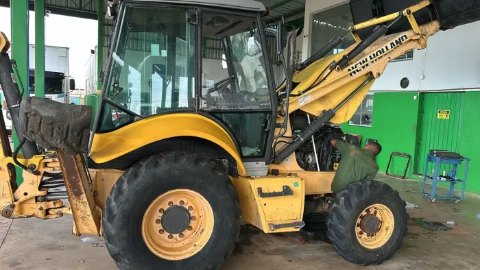 Retro escavadeira New Holland