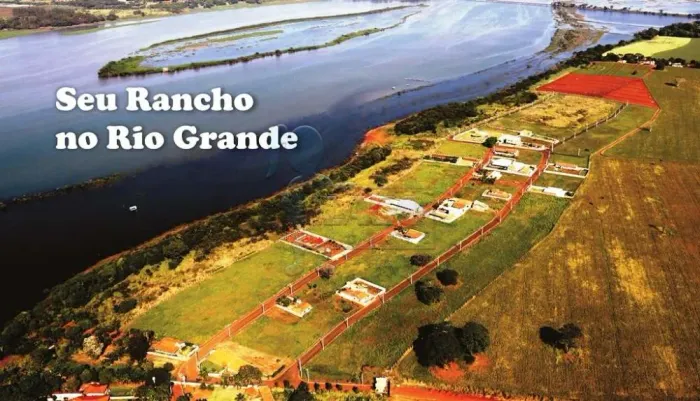 EXCELENTE TERRENO EM CONDOMINIO FECHADO A BEIRA RIO EM PLANURA MG