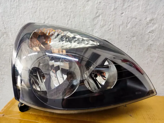 Farol Clio 2003/2012 , lado direito, máscara negra, Original
