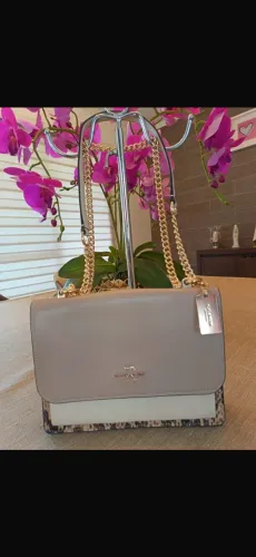 Coach original com código de veracidade