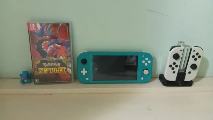 Switch lite em bom estado com 30 jogos na galeria