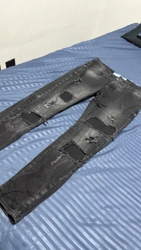calça jeans jogador