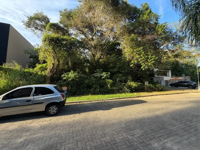 Terreno 390m² no Rio Tavares em condomínio | Buzz Imobiliária