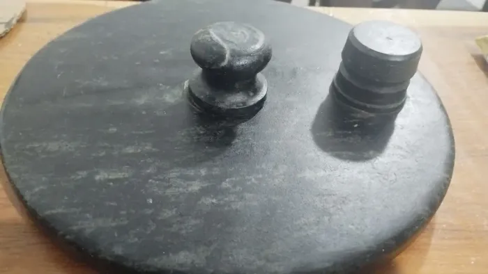 Tampa panela pedra sabão de pressão.