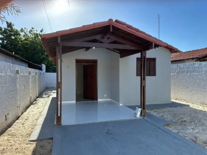 Casa 69m² | 2 Quartos, 1 Suíte | Garagem | Próxima ao Centro