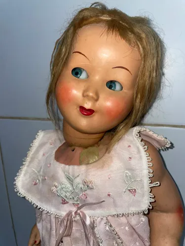 Boneca antiga leiam o anúncio 