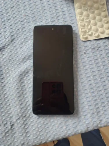 Vendo celular moto 56 vai com carregador original e nota do celular nunca foi trocado a t