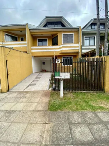 Sobrado com 3 dormitórios para alugar, 153 m² por R$ 3.710,00/mês - Capão Raso - Curitiba/