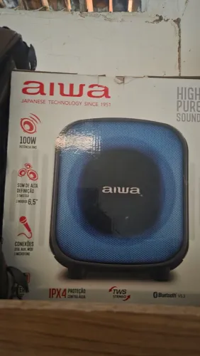 Tol vendendo essa caixa de som toda boa aiwa