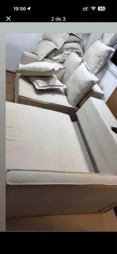 Sofá retrátil vira cama bege na cor linho com algodão macio 