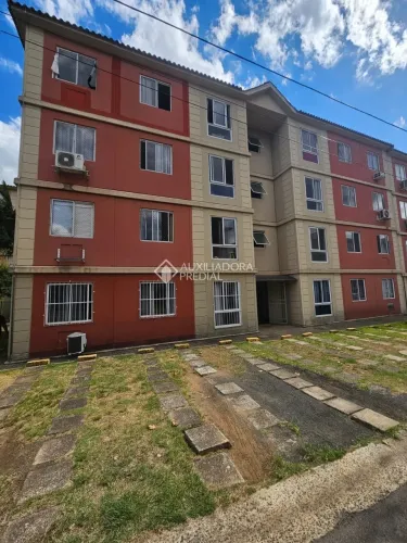 ALUGA APARTAMENTO 02 QUARTOS, SEMI MOBILIADO, UMA VAGA DE GARAGEM - BAIRRO IGARA - CANOAS.