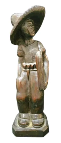 antiga escultura confeccionado em jacarandá, representando menino jornaleiro*