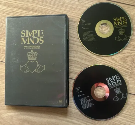DVD SIMPLE MINDS COM O TITULO SEEN THE LIGHTS A VISUAL HISTORY