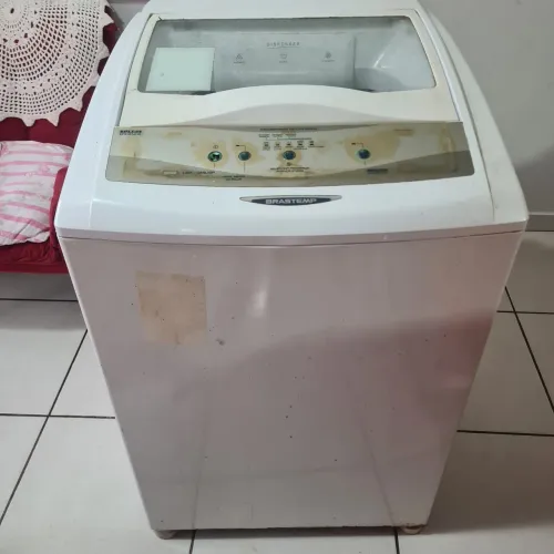 máquina de lavar com defeito