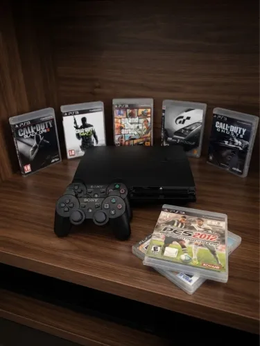 PS3 com 2 controles originais + 7 jogos