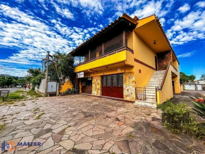 Casa com 2 salas comerciais, 3 quartos, vaga de garagem churrasqueira, suíte, no
