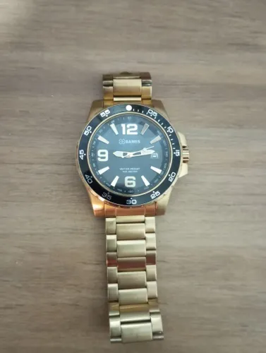 Relógio xgames dourado 200