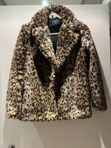 Casaco pêlos animal print 