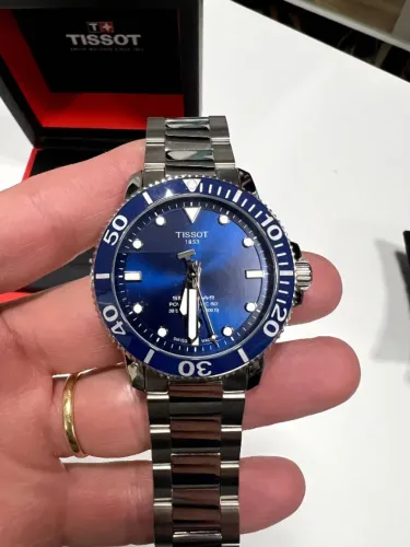 TISSOT SEASTAR 1000 POWERMATIC 80 ? SEMINOVO, SET COMPLETO
