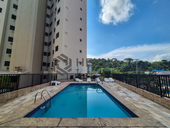 Apartamento com varanda e lazer no Tombo, Guarujá