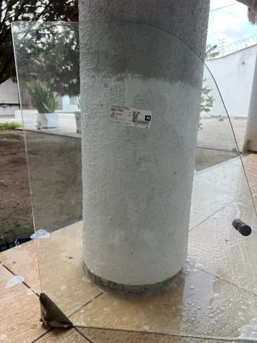 Porta de vidro da escavadeira