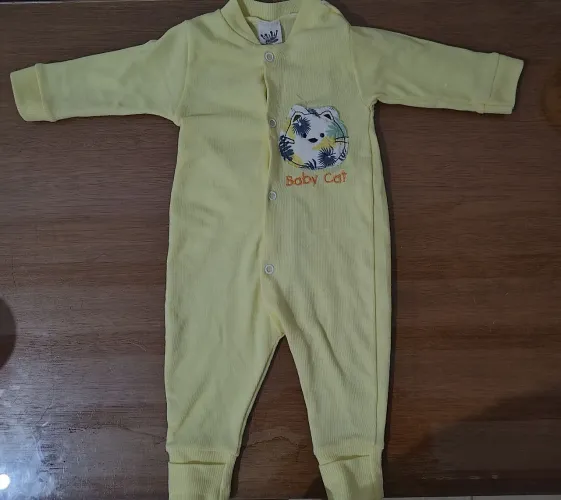 macacão infantil amarelo baby cat