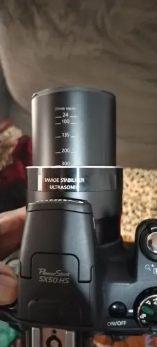 máquina fotográfica da marca canon 