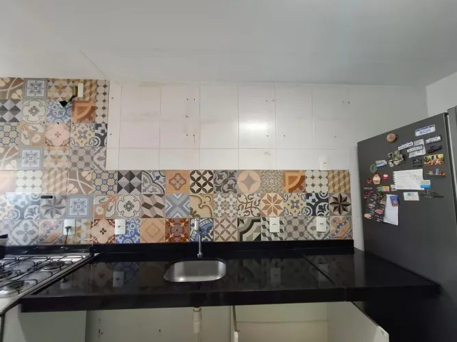 Bancada de cozinha granito preto São Gabriel com cuba inox