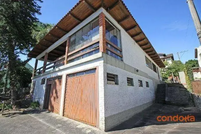 Casa com 3 dormitórios para alugar, 262 m² por R$ 5.340,01/mês - Ipanema - Porto Alegre/RS