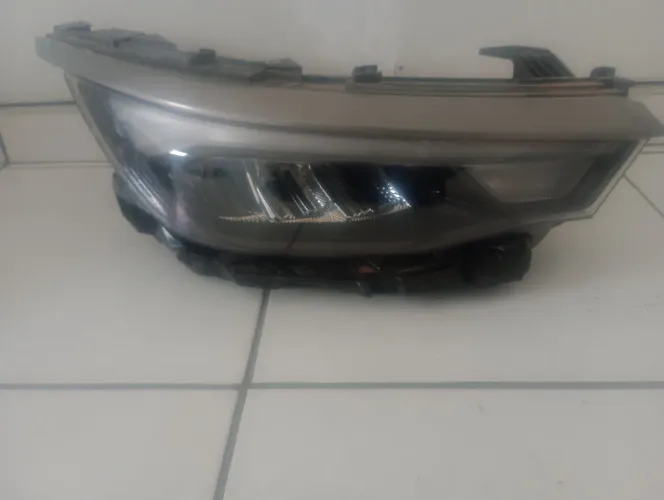 Farol dianteiro Pulse original 2026