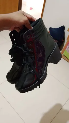 Bota nova na caixa telefone 61. *