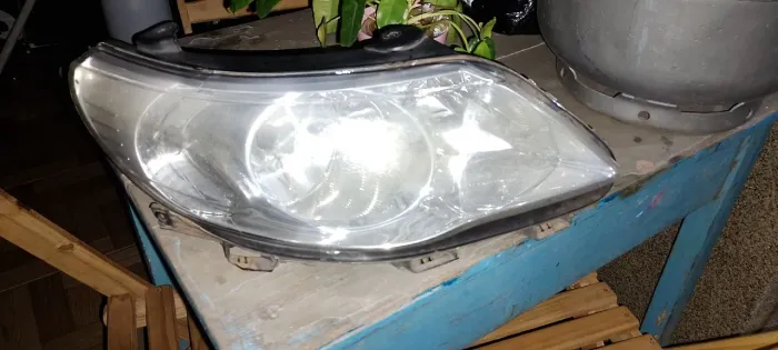 Vendo farol original VOLKSWAGEN lado esquerdo