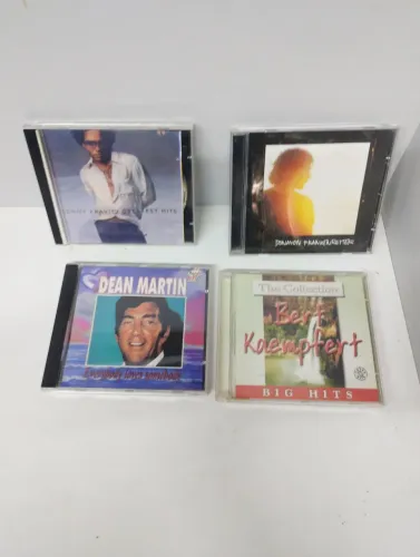 Cds ( 4cds )- Bert kaempfert/Dona Ana frankenreitter /Lenny Kravitz Greatest hits / Dean m