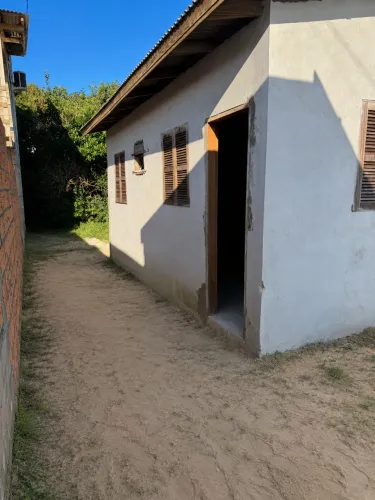 Vendo terreno com casa em construção