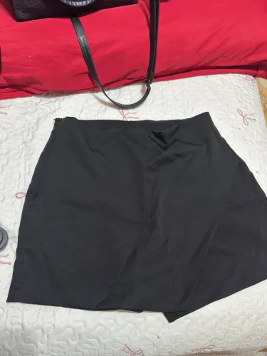 Vendo short saia preto, tamanha 40, usado somente uma vez