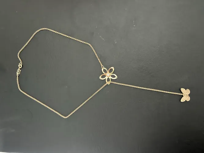 Vendo cordão gargantilha com flor e borboleta da Rommanel 
