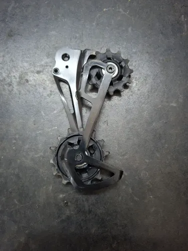 Cage Sram NX Eagle 12v empenado