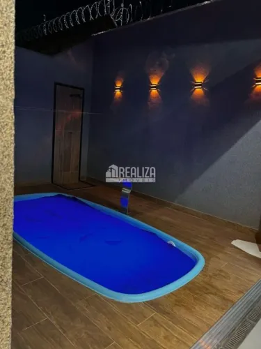 Casa à venda no Jardim Espanha, Uberaba | 2 dormitórios, suíte, piscina e varanda gourmet