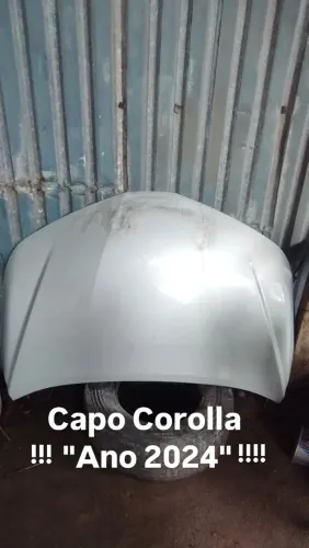 Capô do Corolla preto e cinza e branco 